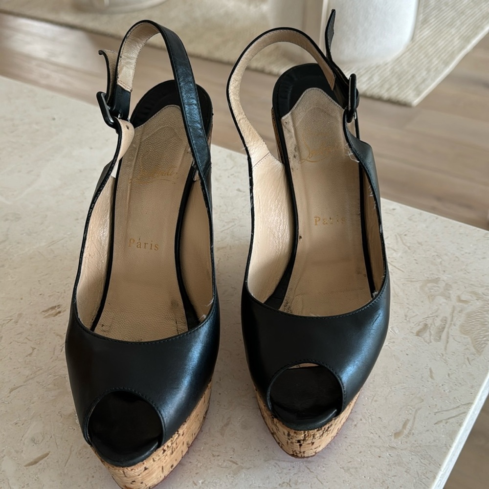 Christian louboutin    black leather wedges in great condition